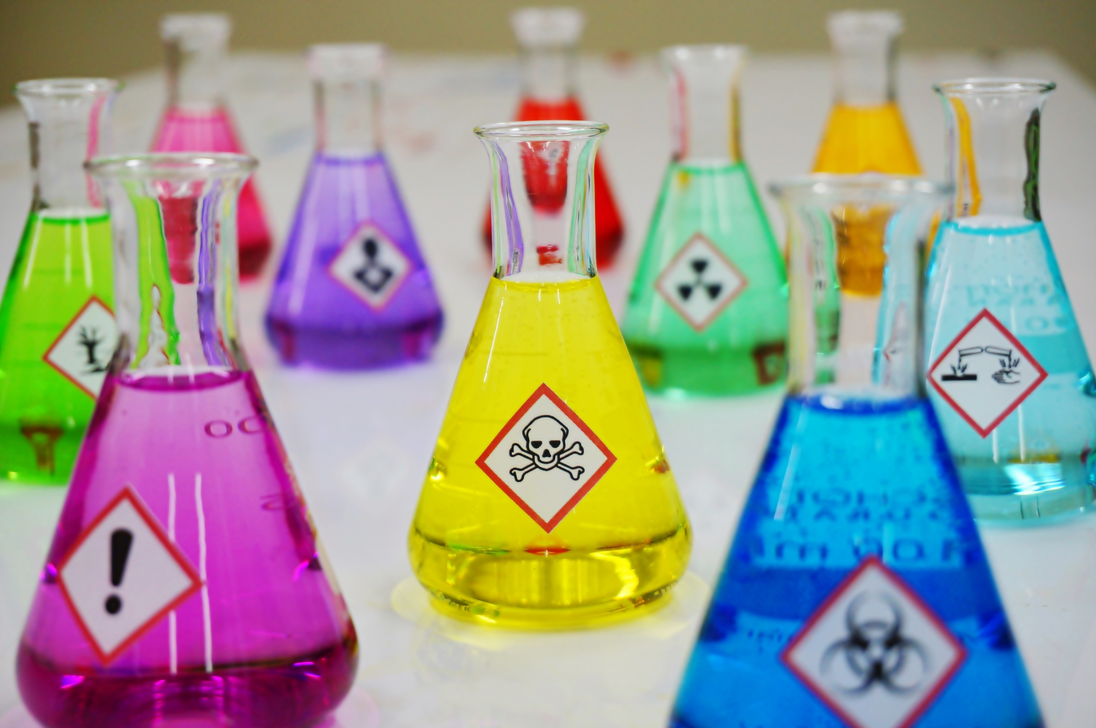 Erlenmeyer flask with hazard symbol.
